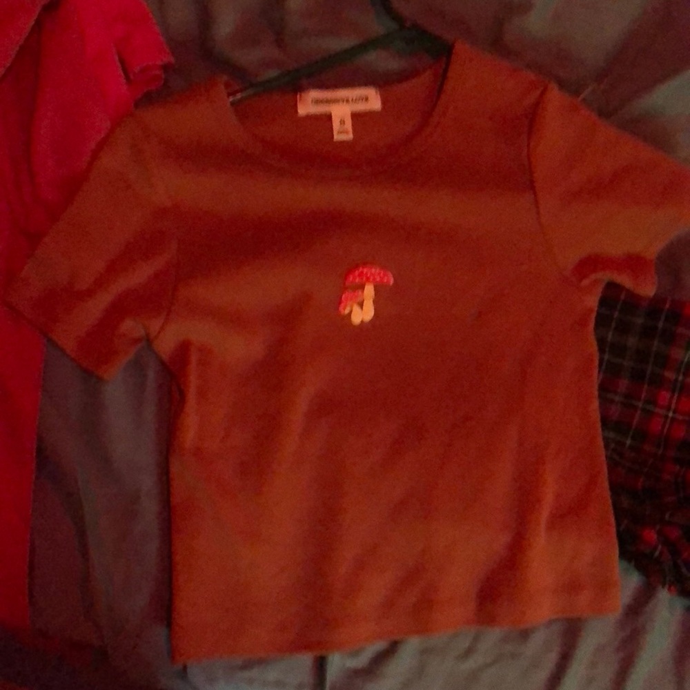 Brownish crop top shirt with mushrooms on it